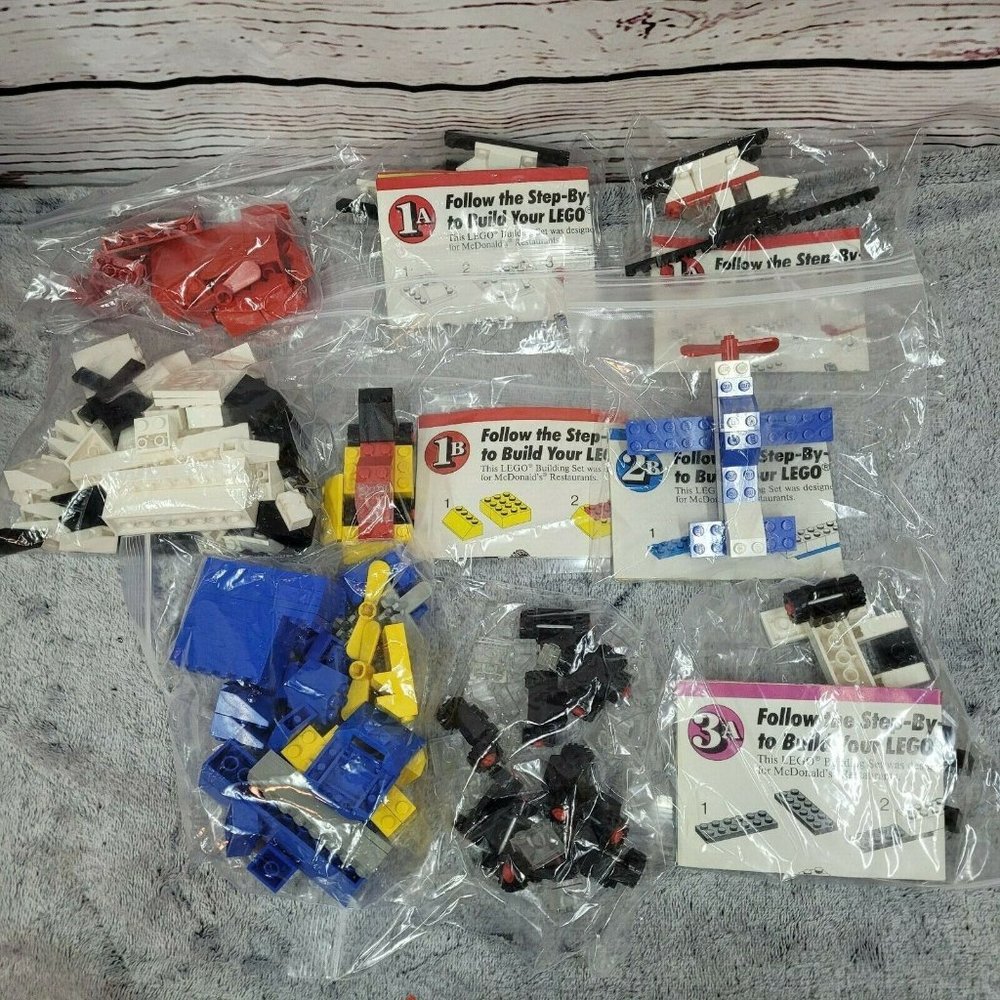 LOT 7 VINTAGE LEGO MCDONALDS PLANE SETS plus loose legos